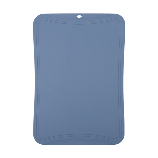 A rectangular blue cutting board with rounded corners and a hanging hole at the top, shown against a plain white background.