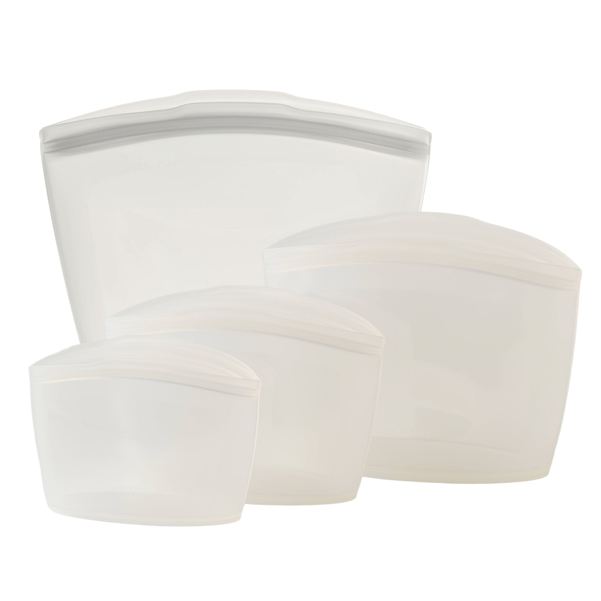 Set of four clear-colored silicone bags on a white background