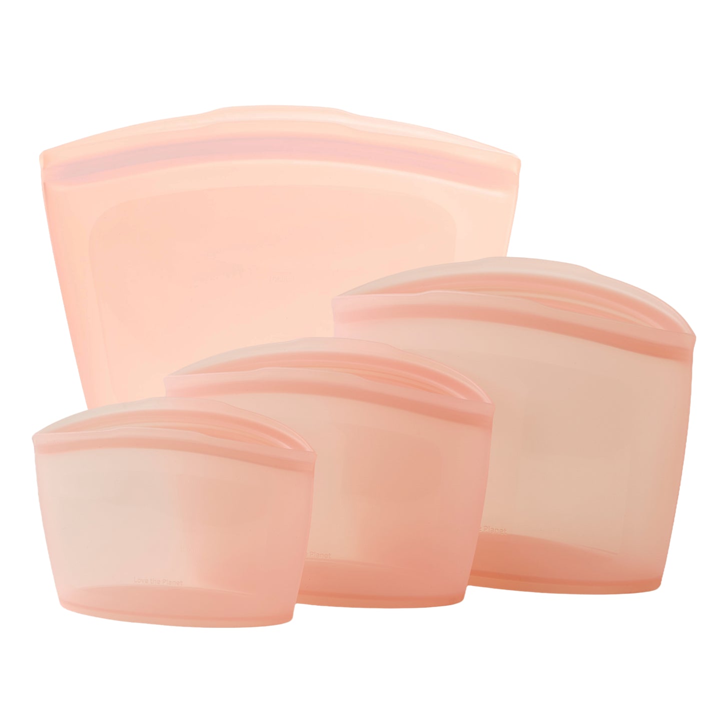 Set of four peach-colored silicone bags on a white background