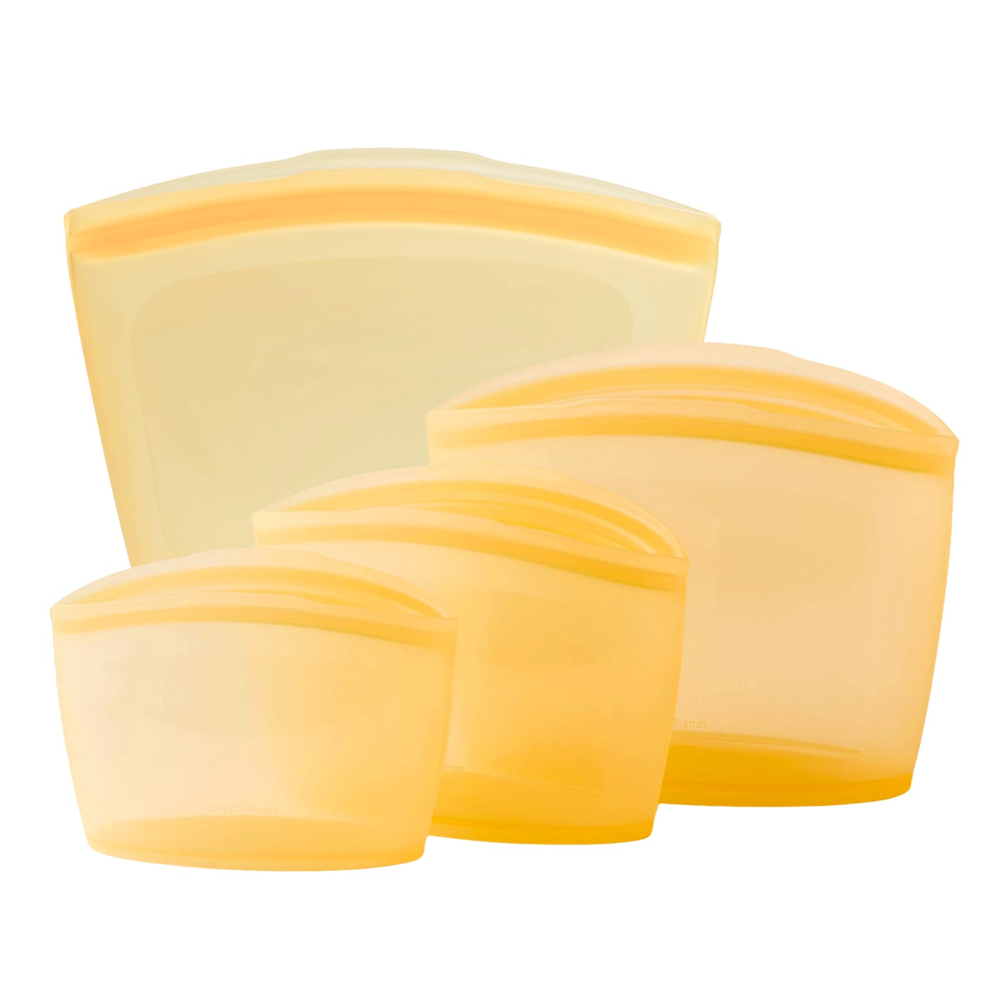 Set of four pumpkin yellow-colored silicone bags on a white background