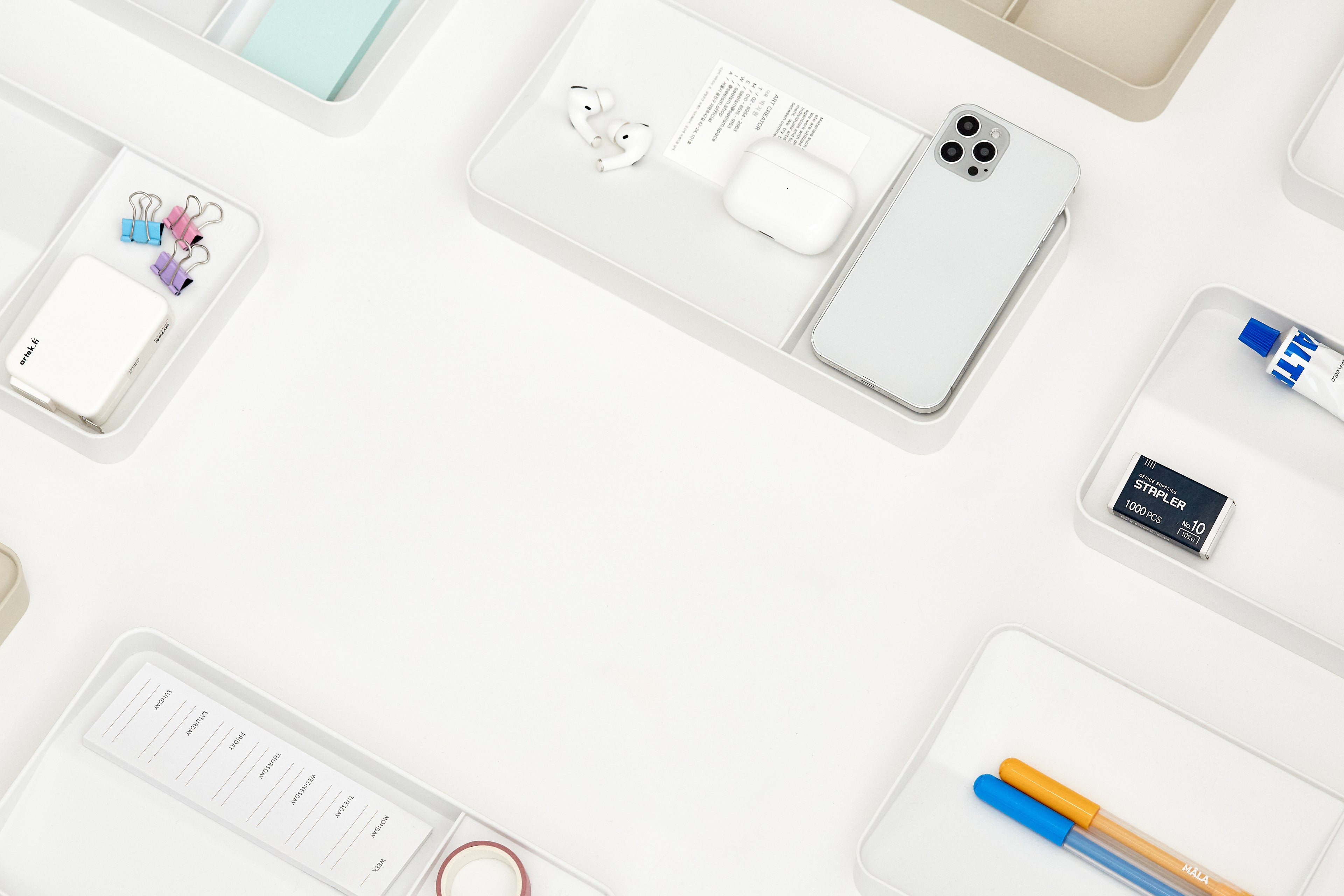 Doubles Sided Desktop storage trays on a white desk.