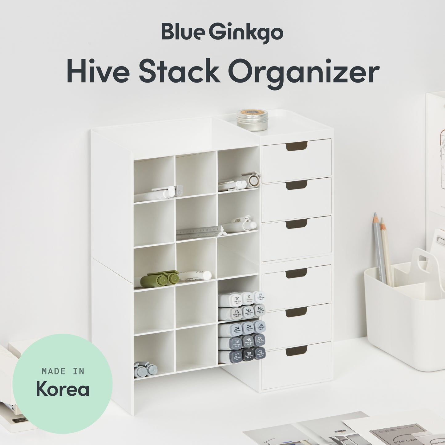 Blue Ginkgo Hive Stack Organizer with drawers on a white surface.