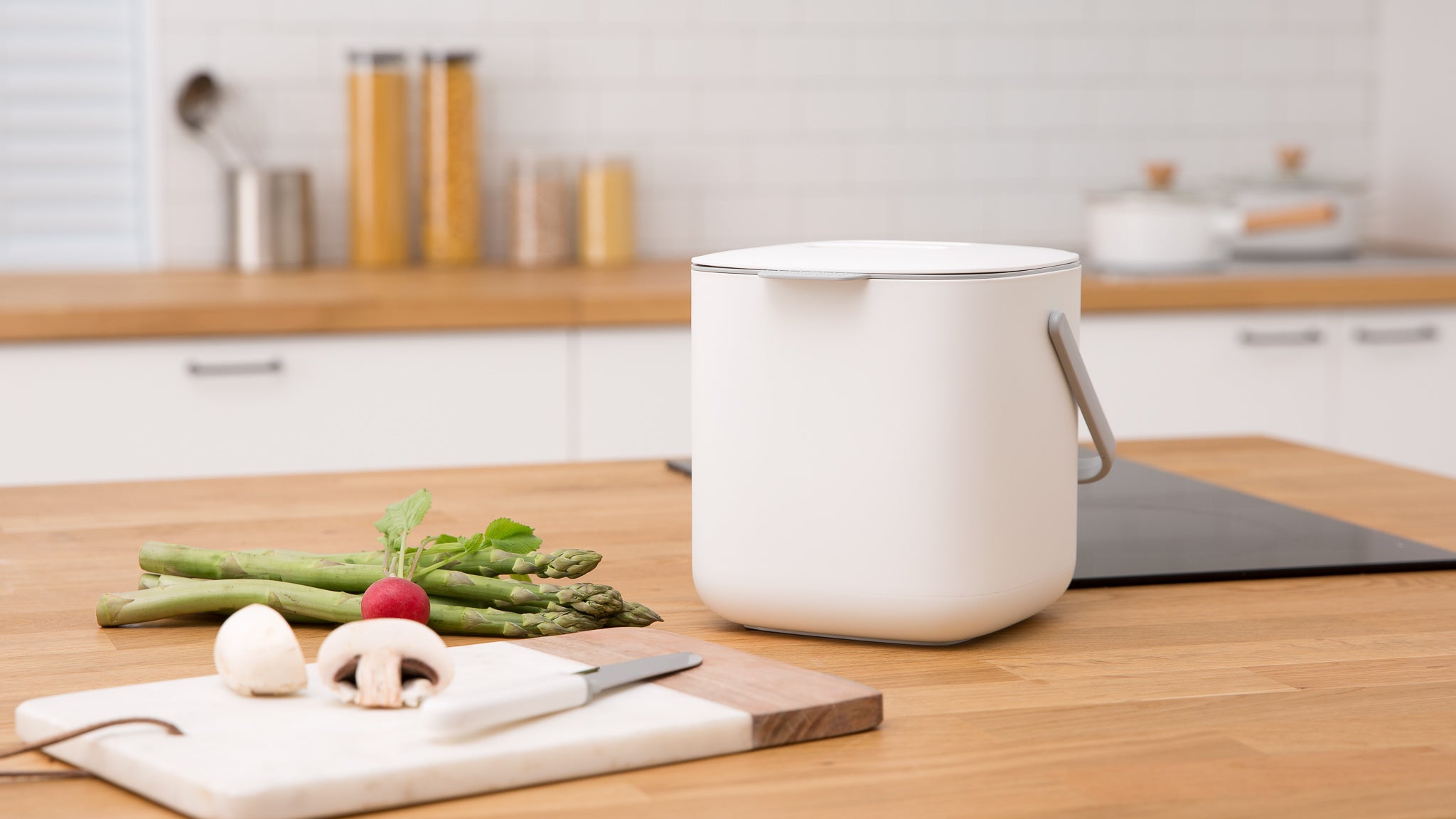 White Kitchen Food Waste Bin on a Countertop