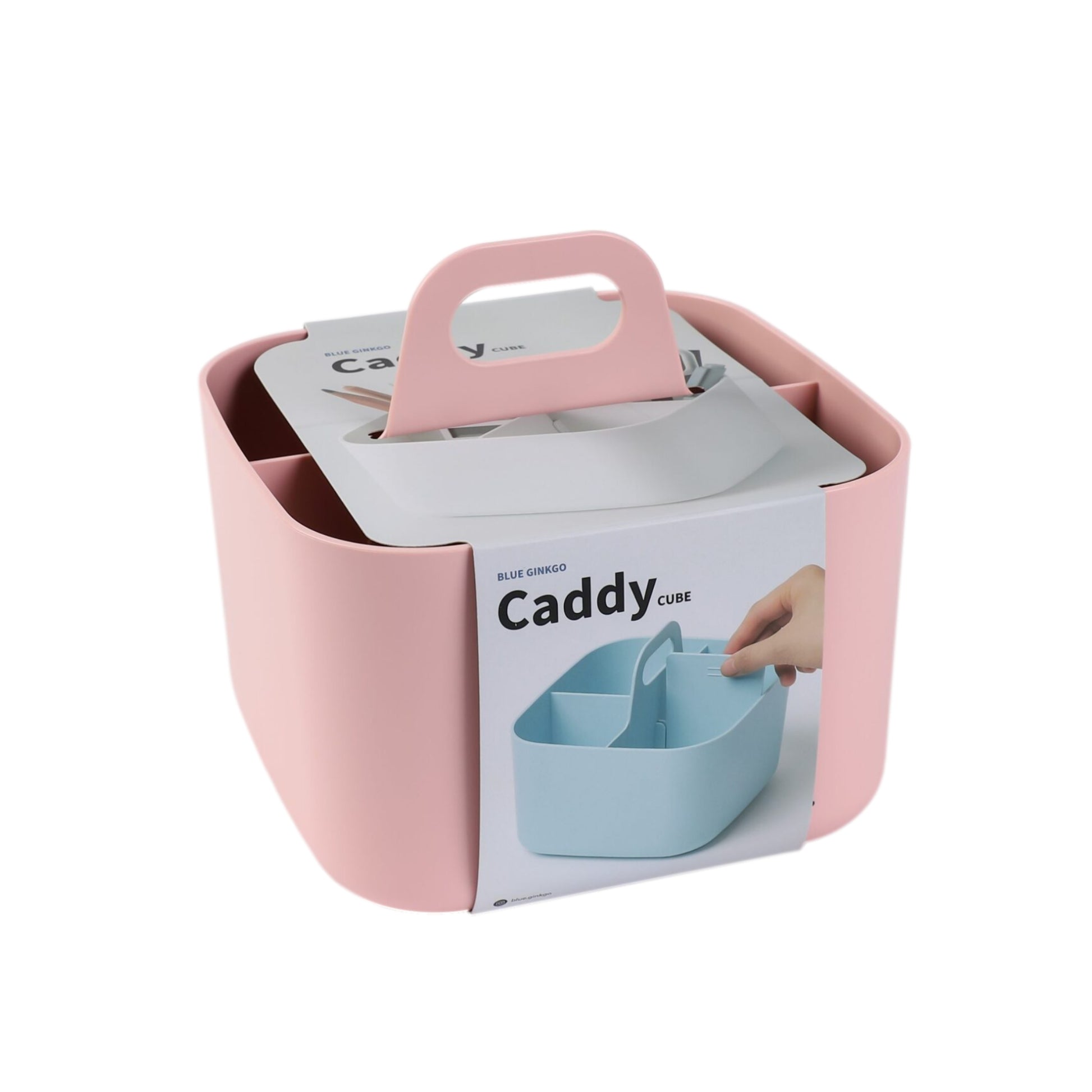 A pink square storage caddy with a handle on top against a white background